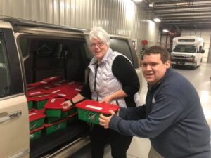 Pat and Lee preparing to deliver OCC shoeboxes